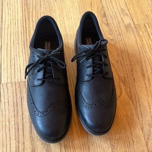 Johnston & Murphy Wing Tip Sneakers.